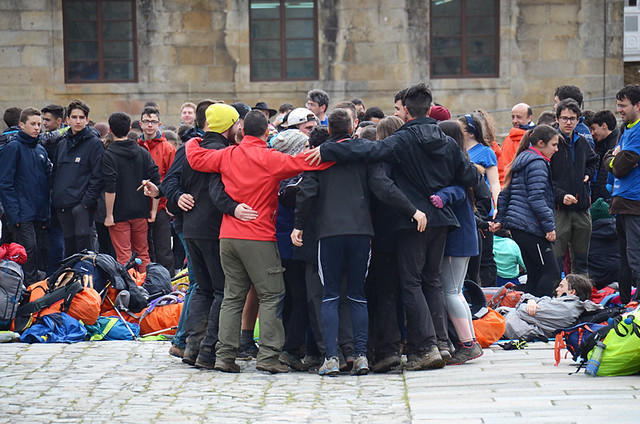 Pilgrims reaching the end of the road, Santiago de Compostela, Galicia