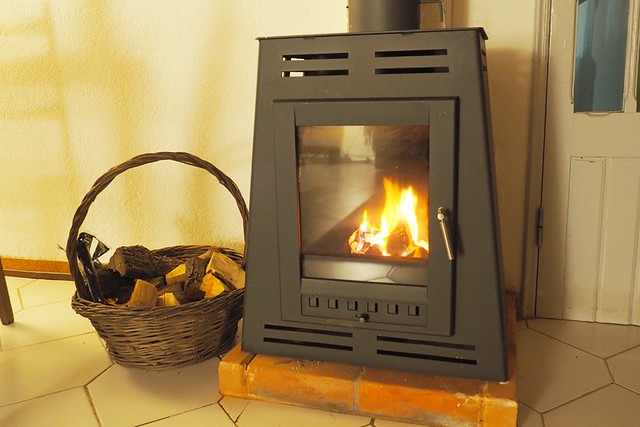 Autumn in Portugal, Wood burning stove and wood basket
